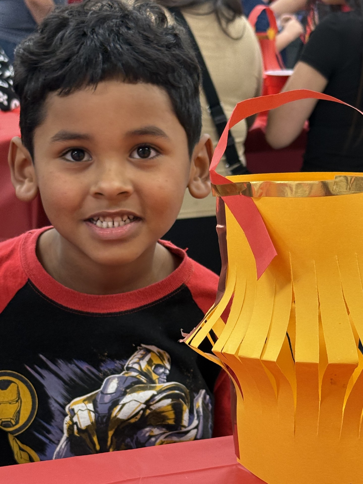 kid with paper basket